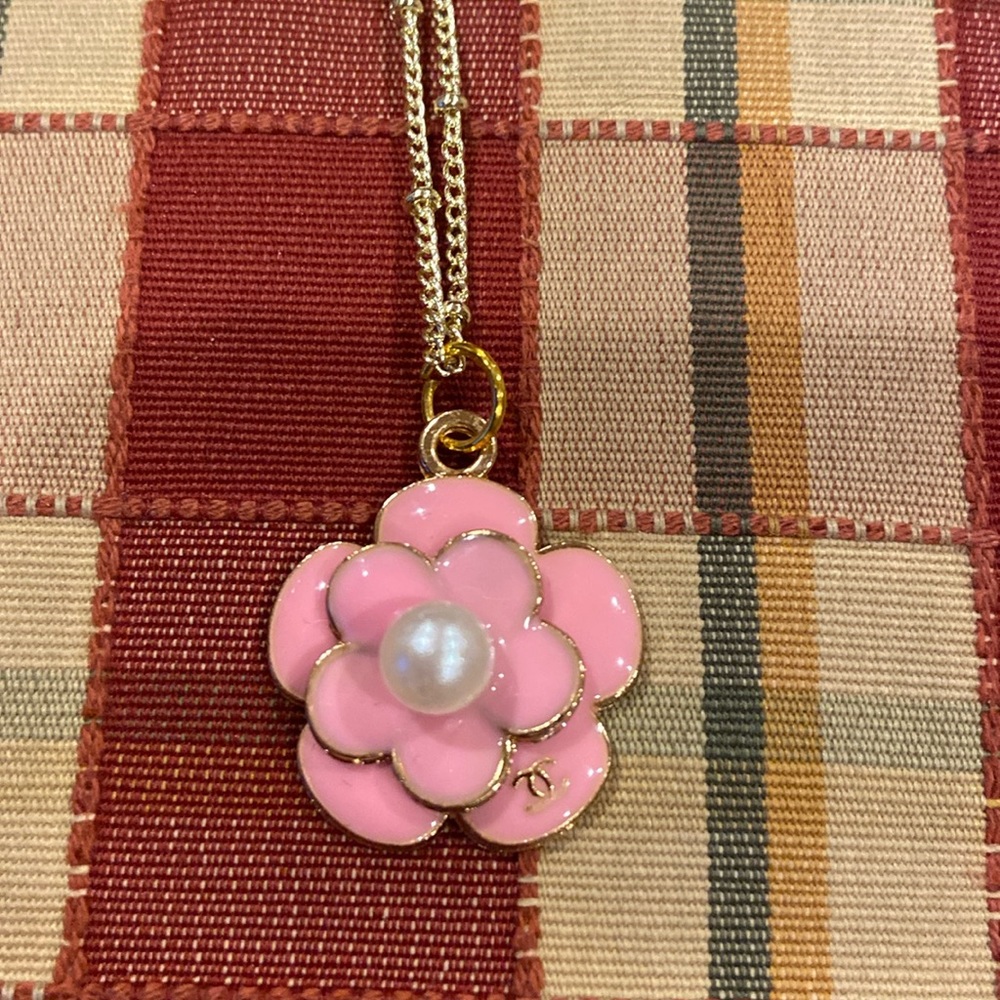 Not authentic Chanel necklace.